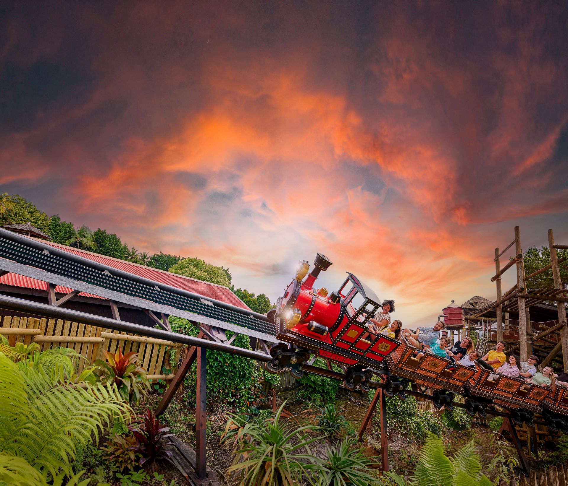 Guests on Runaway Mine Train at Dusk